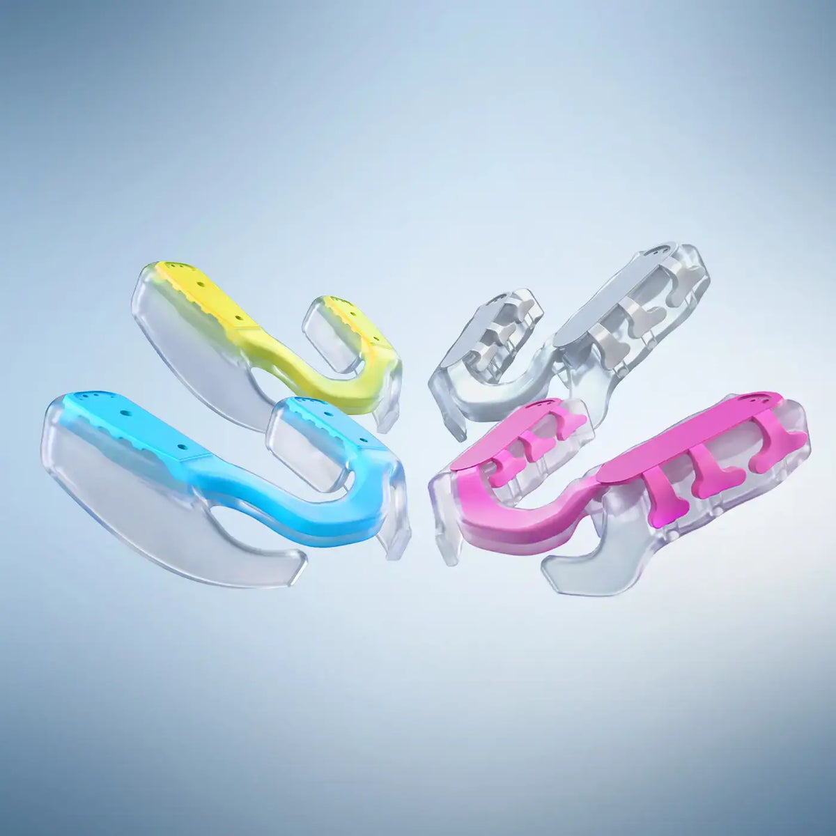 PX1 Performance Mouthpieces in blue and yellow. PX2 Performance Mouthpieces in pink and white.