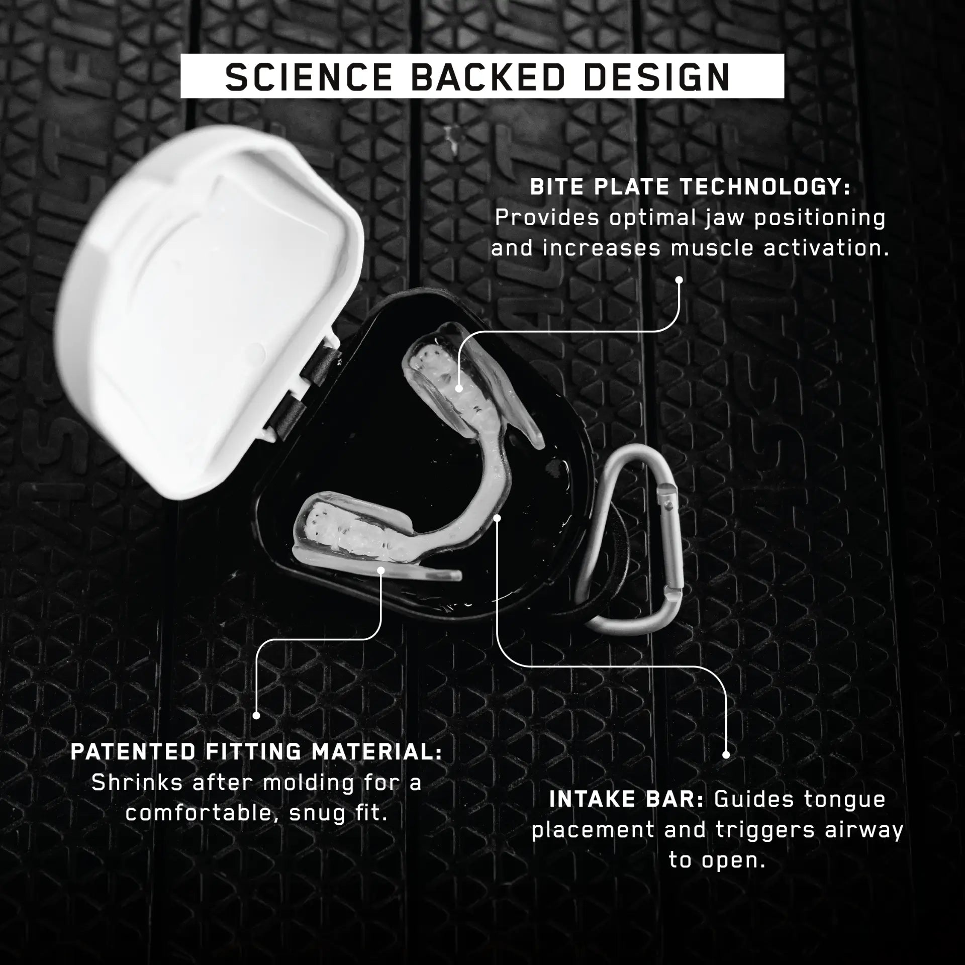 Black and white mouthpiece with white storage case shown disassembled, displaying bite plate, intake bar, and fitting materia